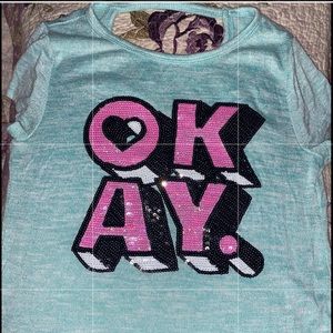 Girls’ size (14) shirt